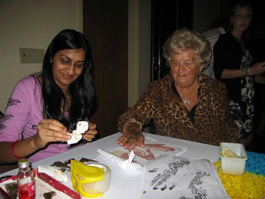A woman and a woman sitting at a table