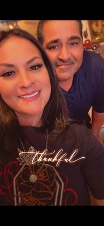 A man and woman taking a selfie