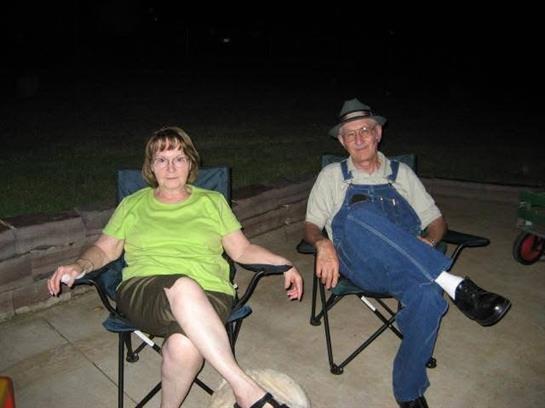 A man and woman sitting in chairs