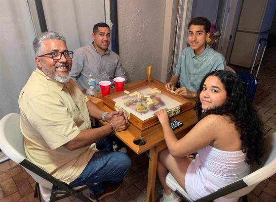 A group of people sitting around a table