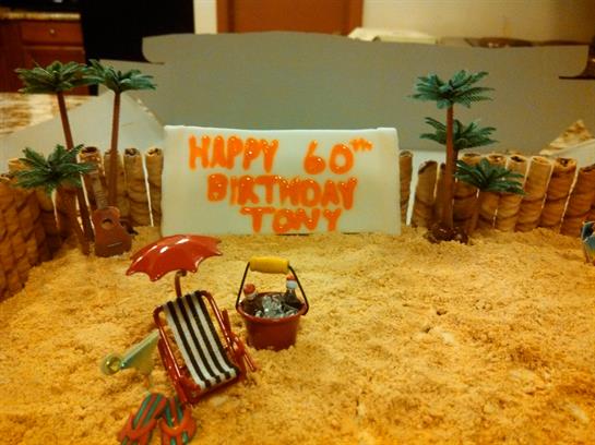 A beach scene with a sign and palm trees