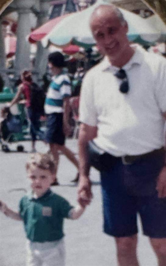 A man and child walking