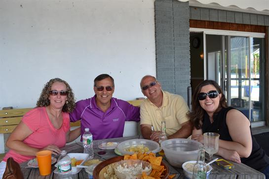 A group of people sitting at a table