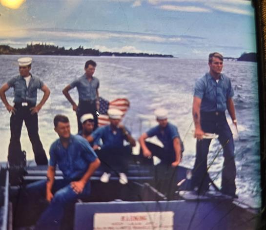 A group of men on a boat