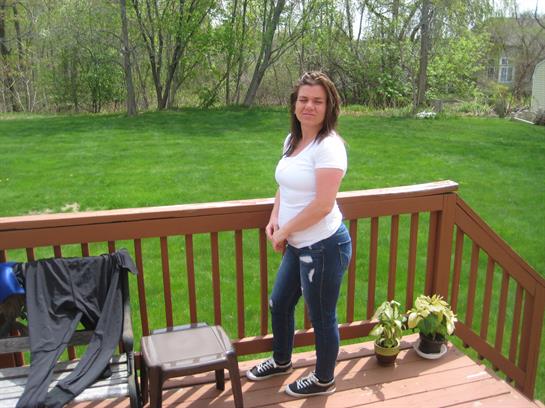 A woman standing on a deck