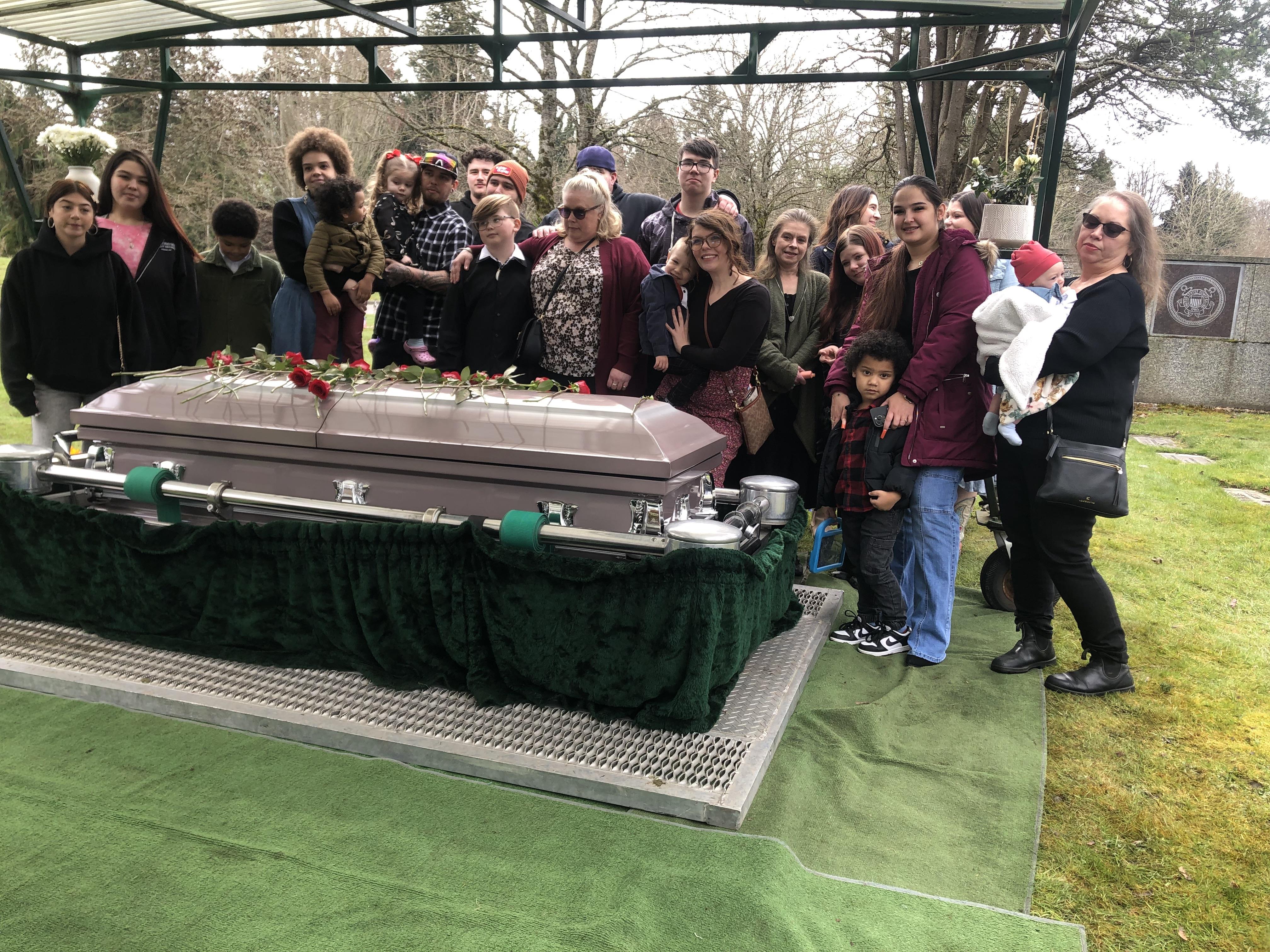 Loved ones come together to honor a cherished individual during an emotional memorial gathering.