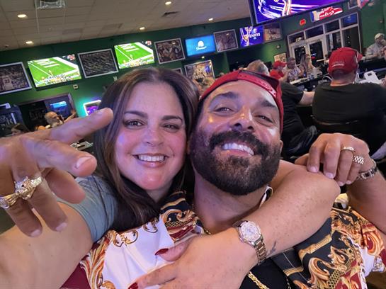 A man and woman taking a selfie