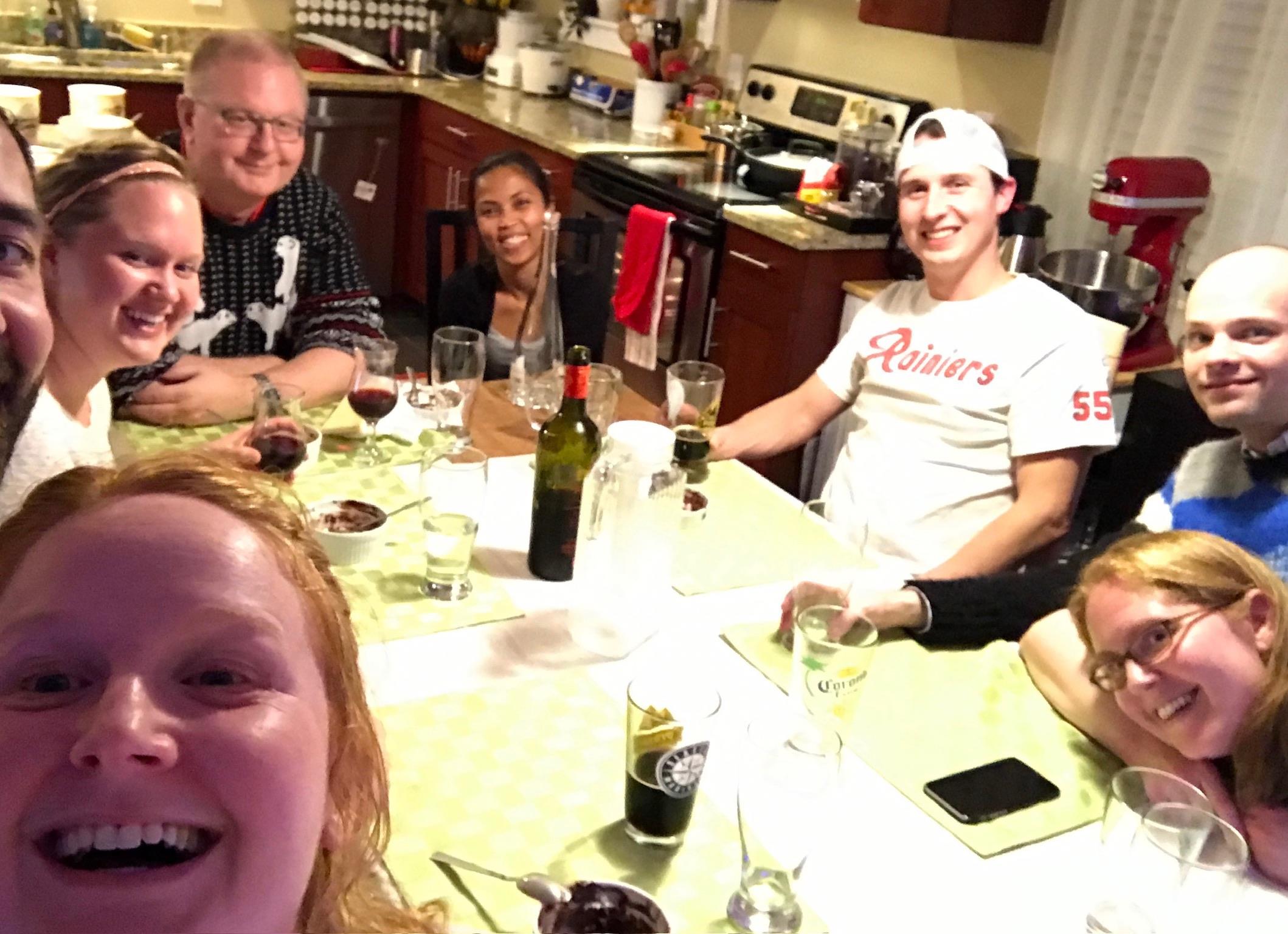 A group of people sitting around a table