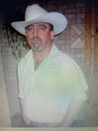 A man wearing a cowboy hat