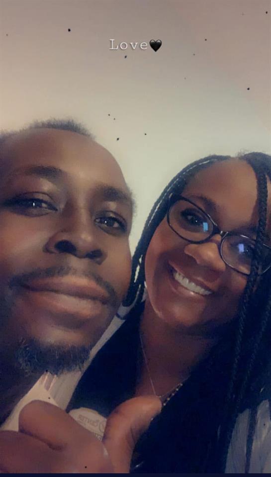 A man and woman taking a selfie