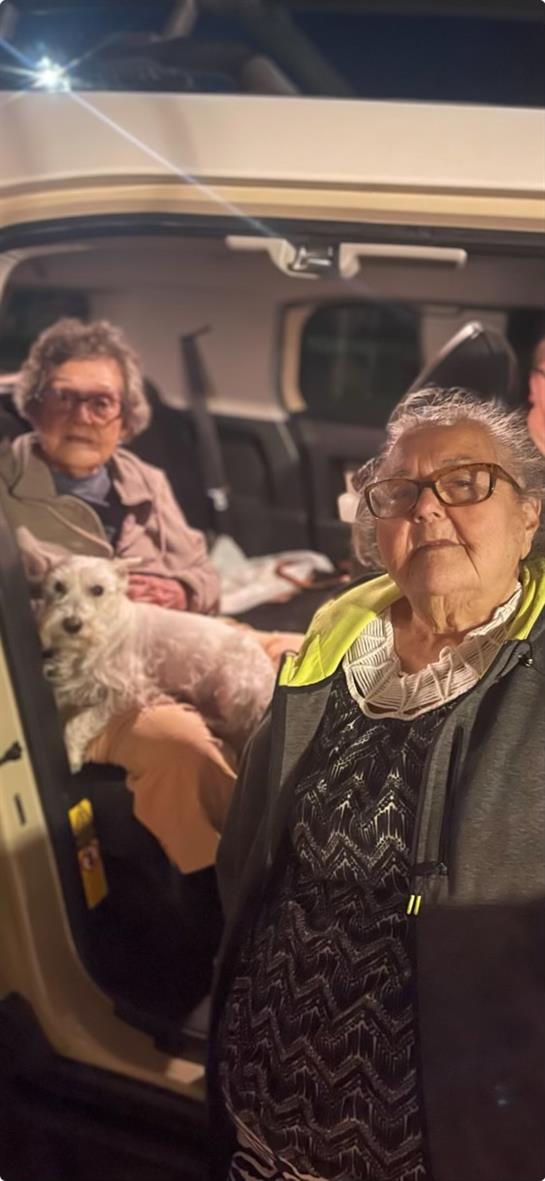 A group of women sitting in a car
