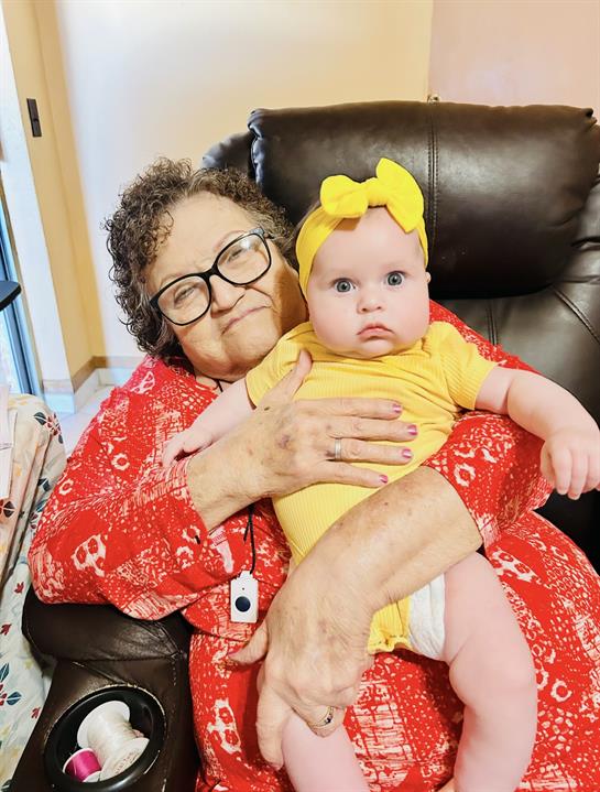 A woman holding a baby