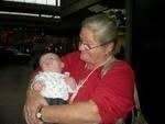 A woman holding a baby