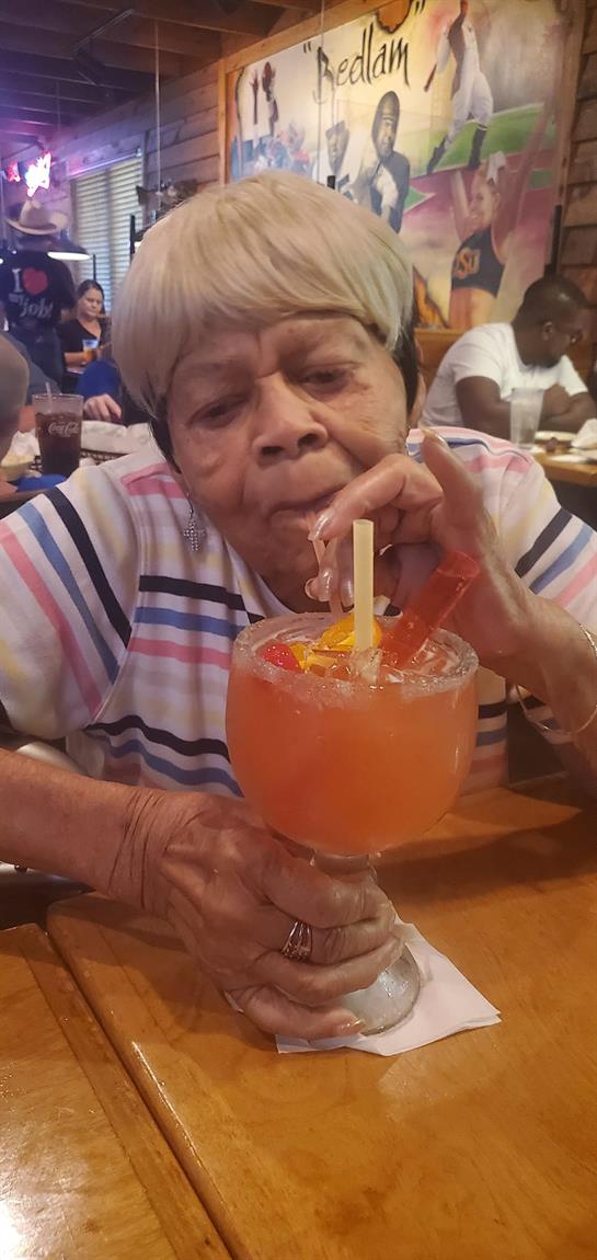 A woman drinking a drink