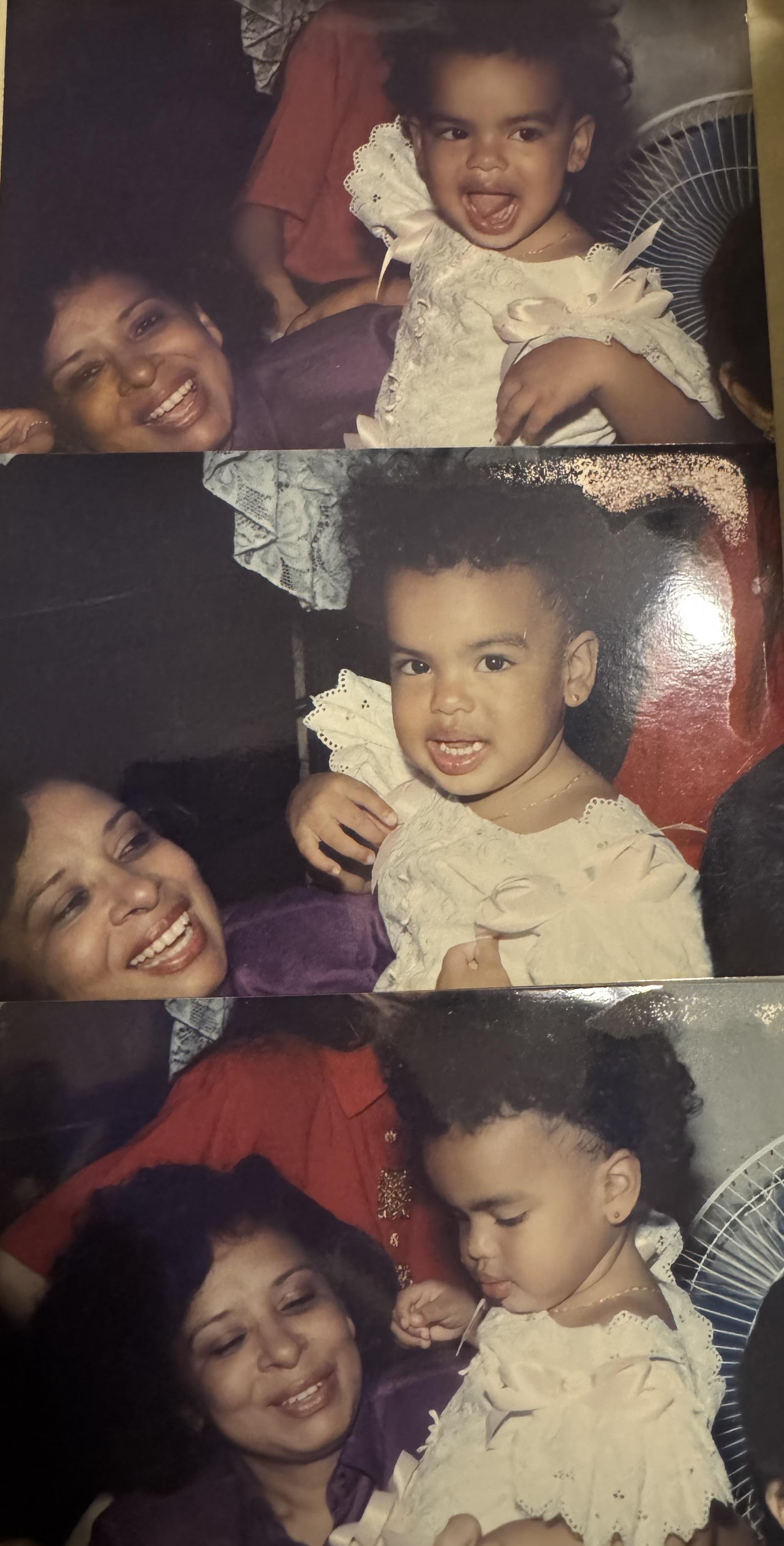 A joyful moment capturing a child with curly hair embraced by family members during a gathering.
