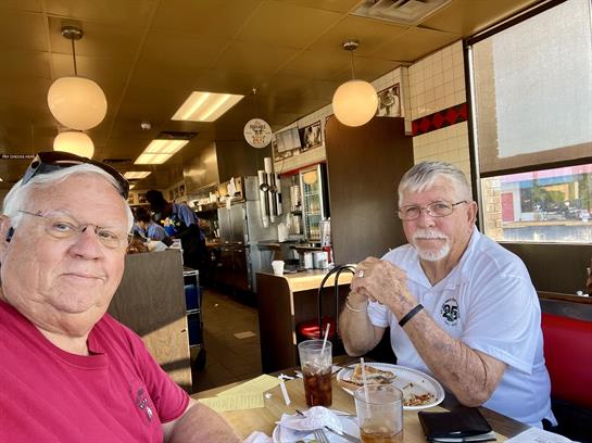 Two men sitting at a table