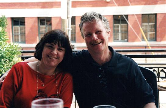 A man and woman sitting at a table