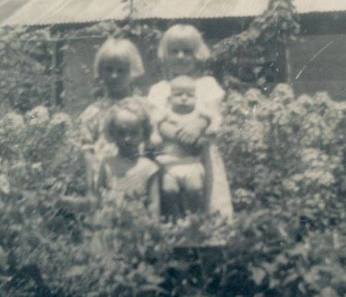 A group of children posing for a picture