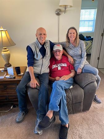 A group of people sitting on a couch