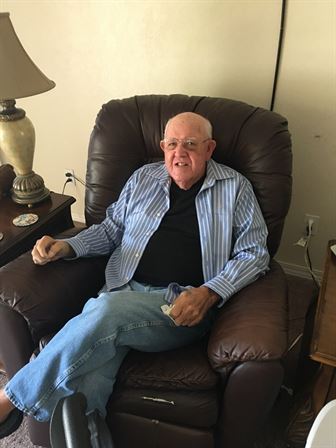 A man sitting in a chair