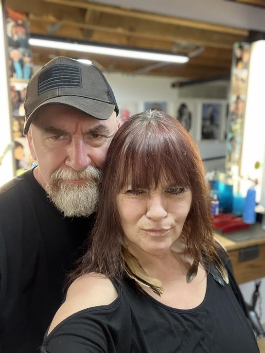 A man and woman taking a selfie