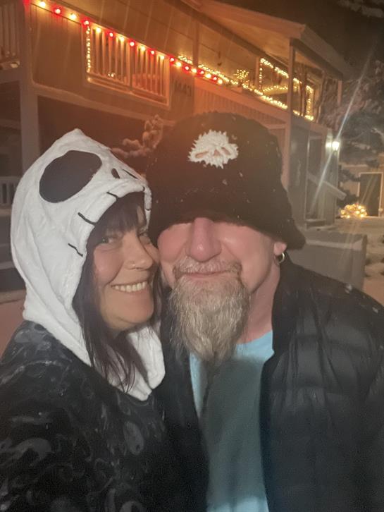 A man and woman taking a selfie