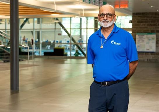 A man in a blue shirt