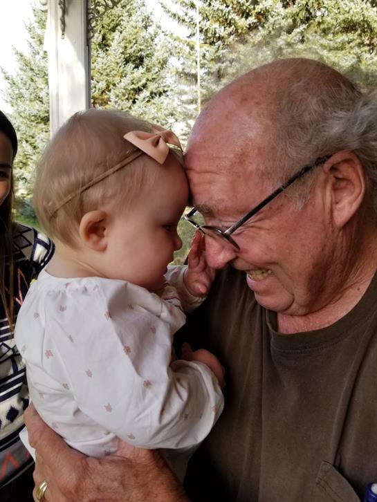 A man holding a baby