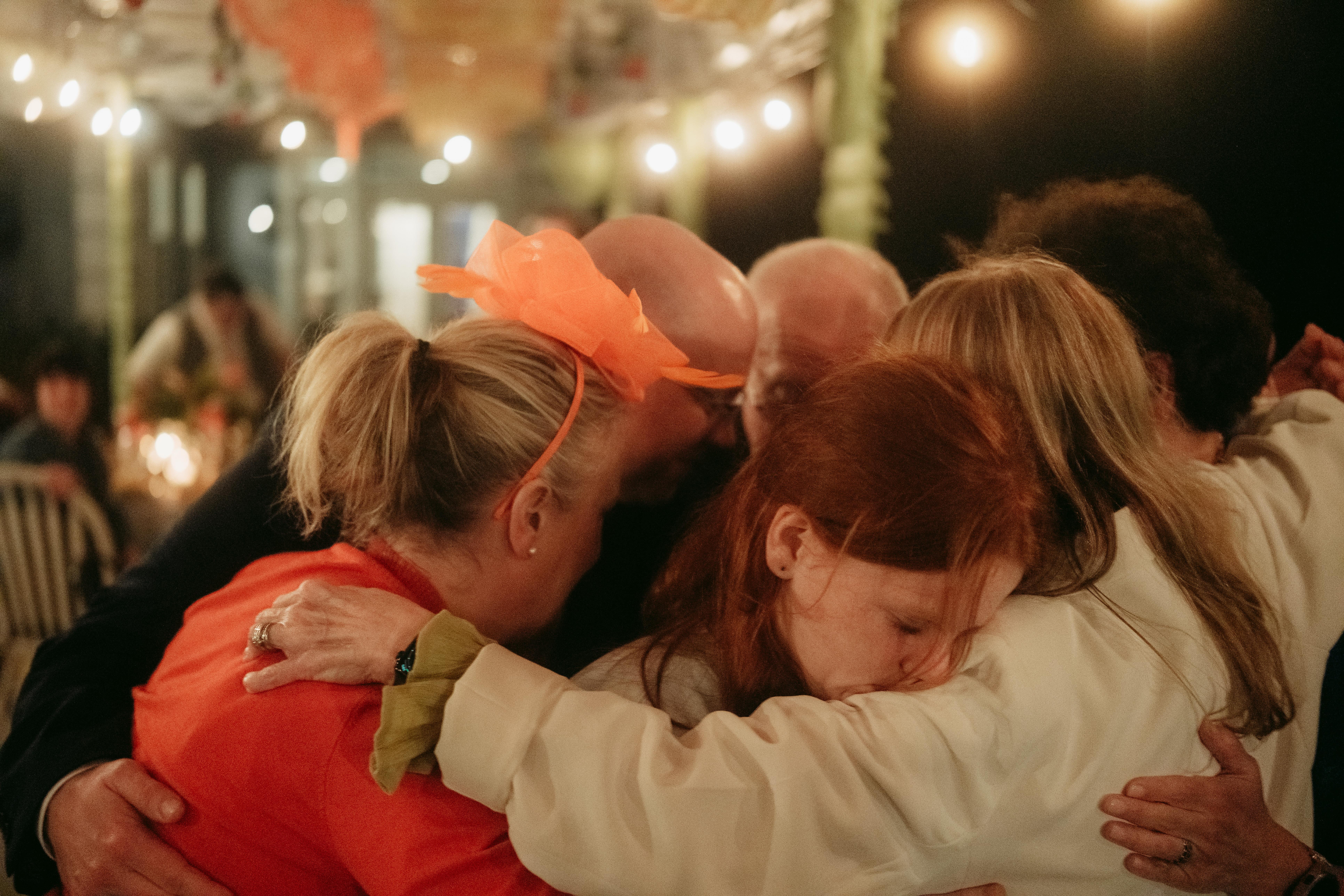 A group of people hugging