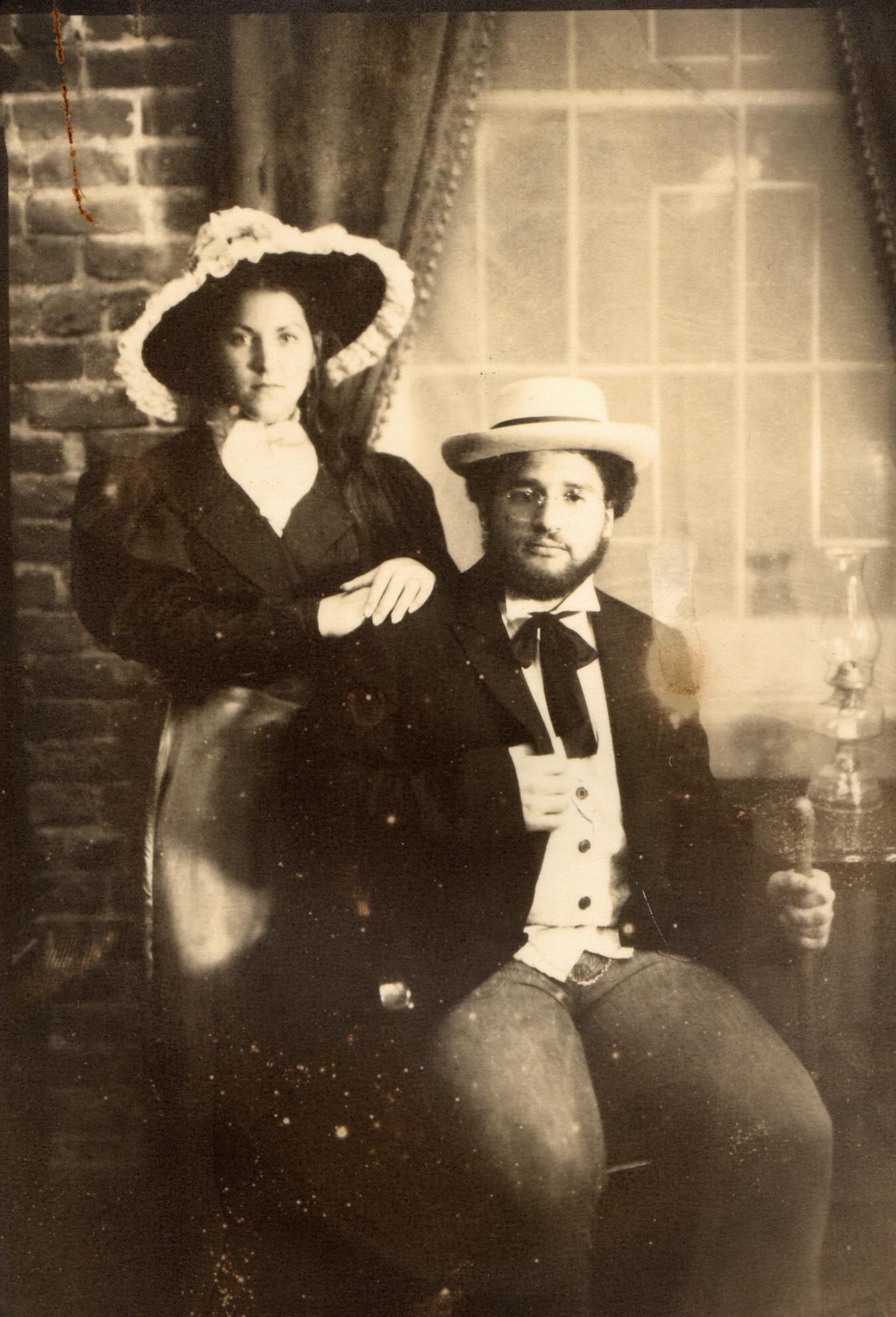 A man and woman in hats
