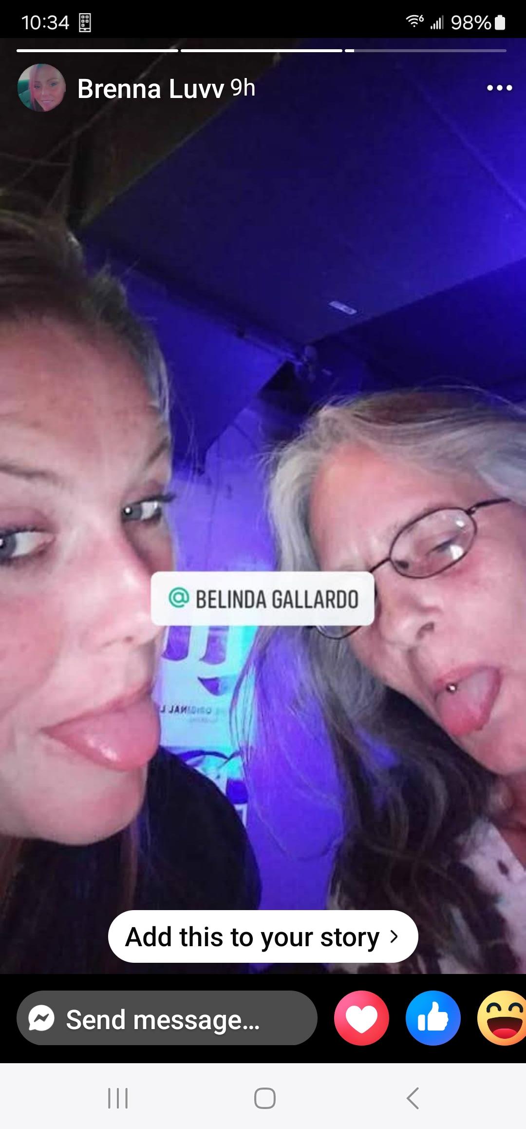 Two friends pose for a fun selfie, sticking out their tongues and enjoying their time together.