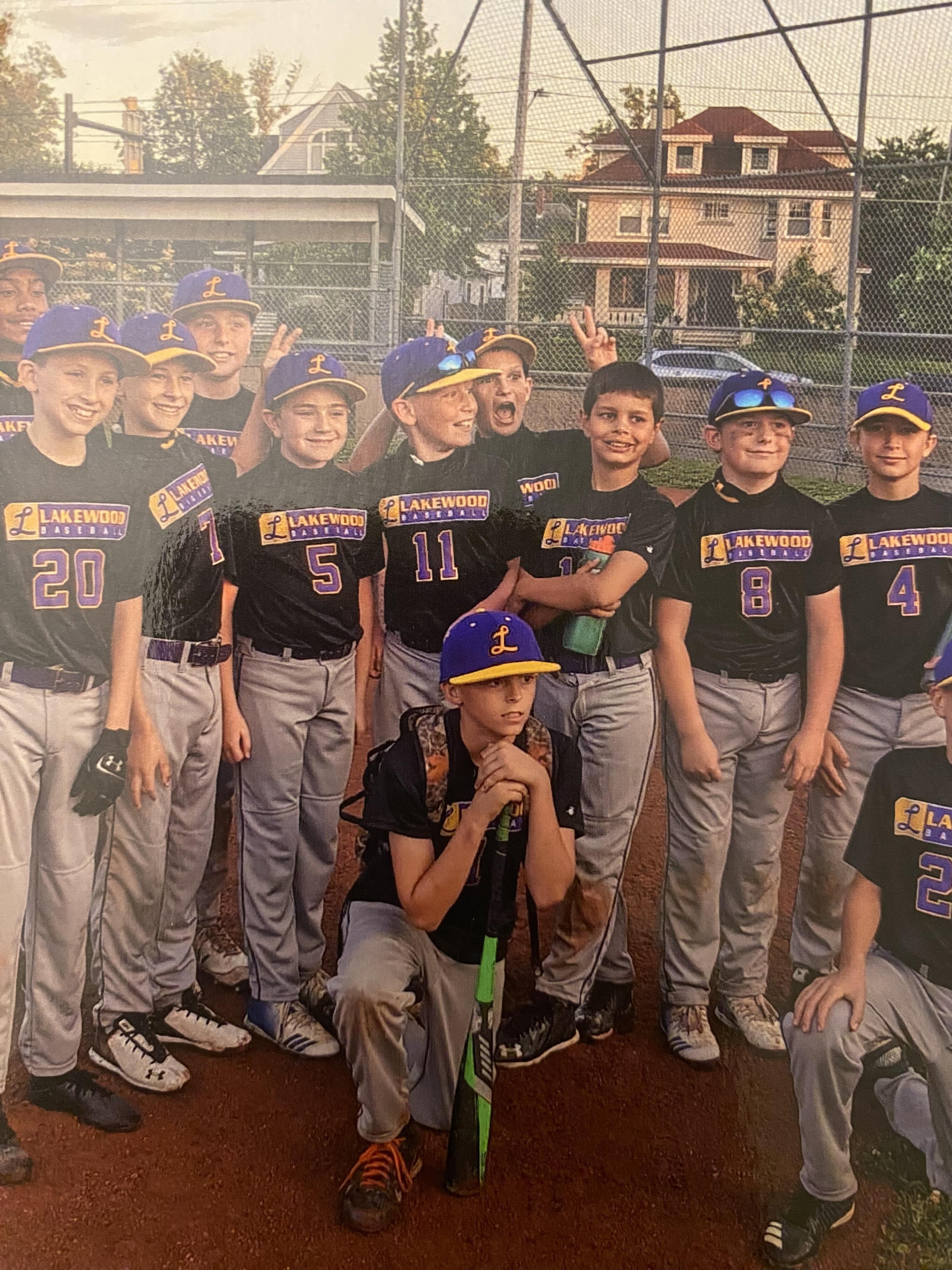 A group of boys in baseball uniforms