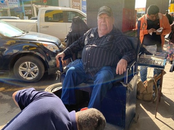 A man sitting in a wheelchair