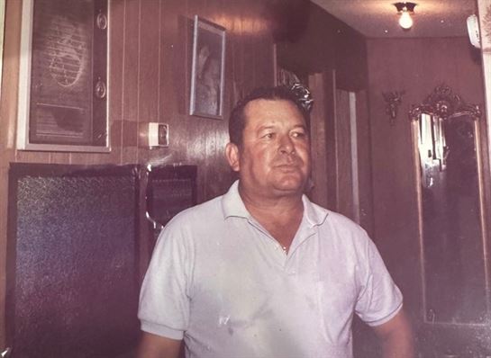 A man in a white shirt