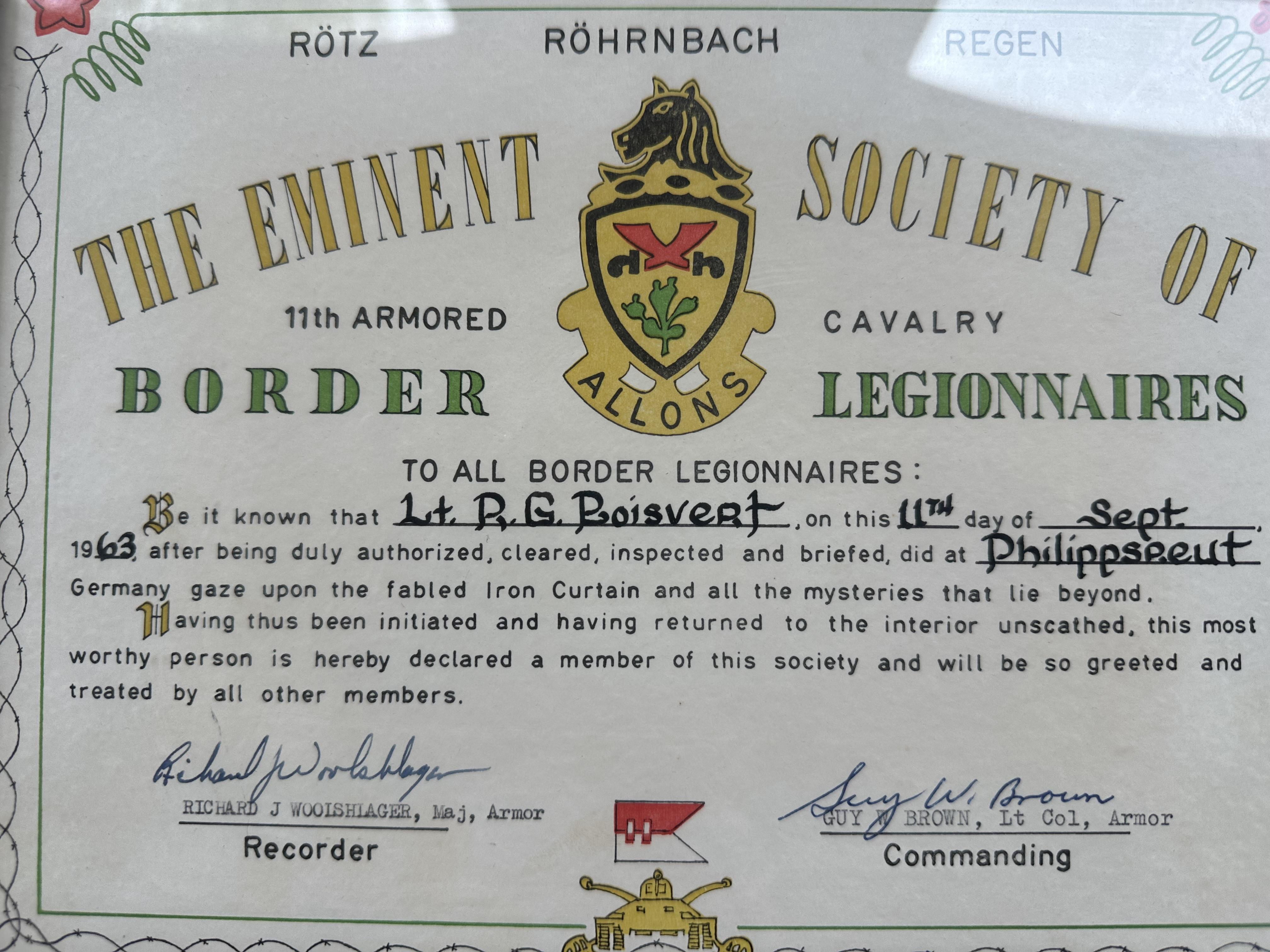 The document commends Lt. R.G. Boisvert for his service and details the honor received in 1963.