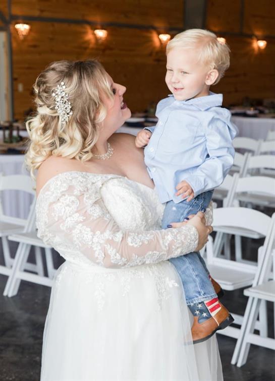 A woman holding a child