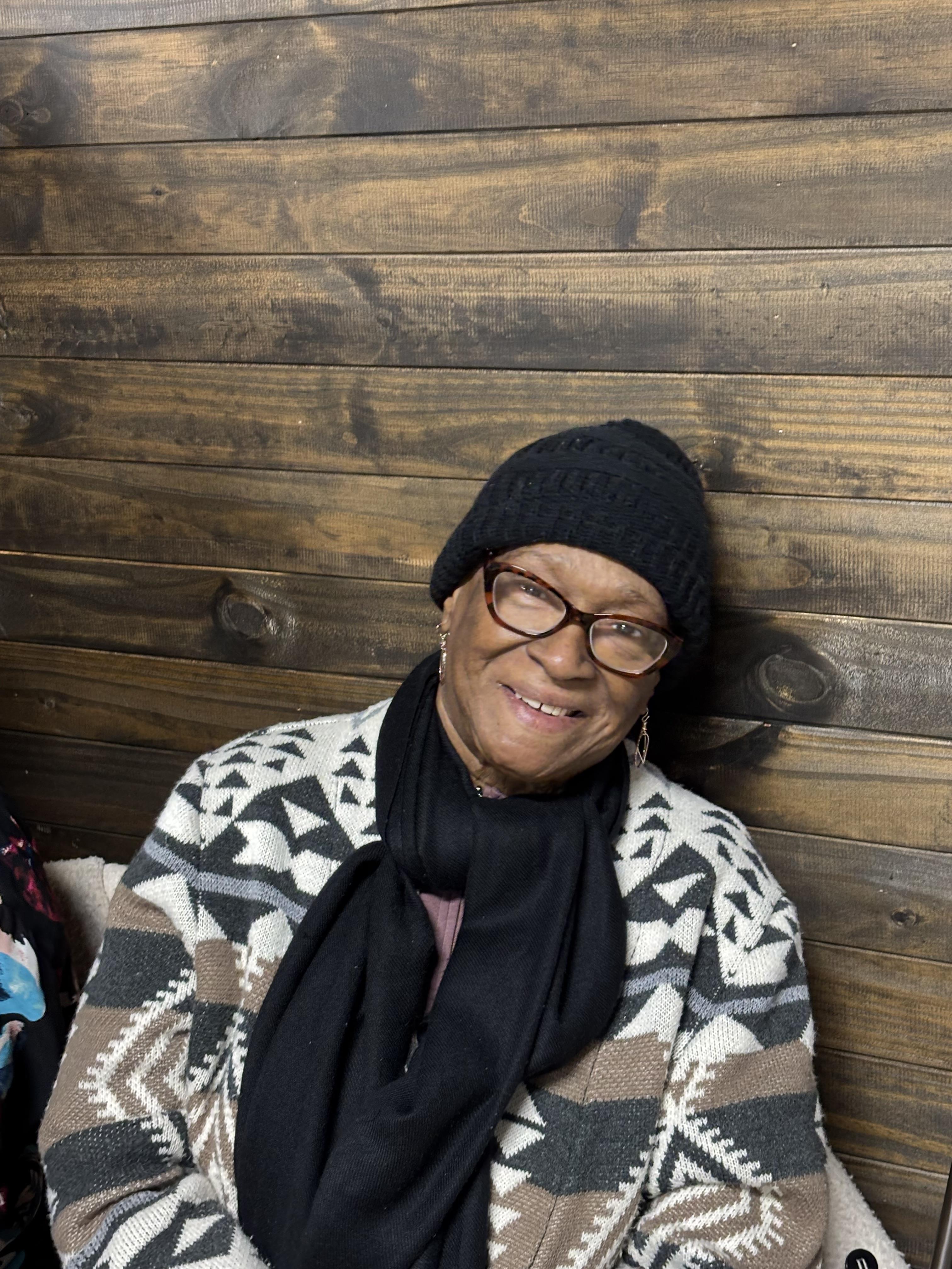 A woman smiling at the camera