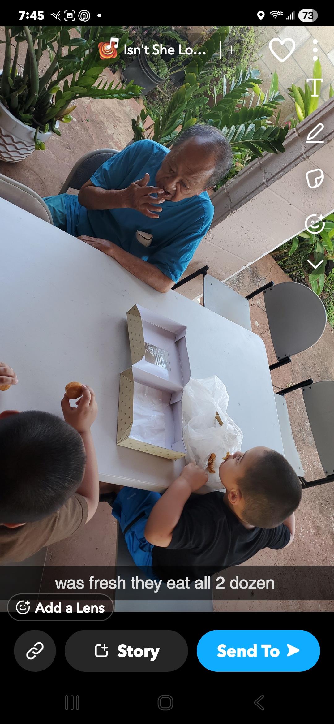 A group of people sitting at a table eating food