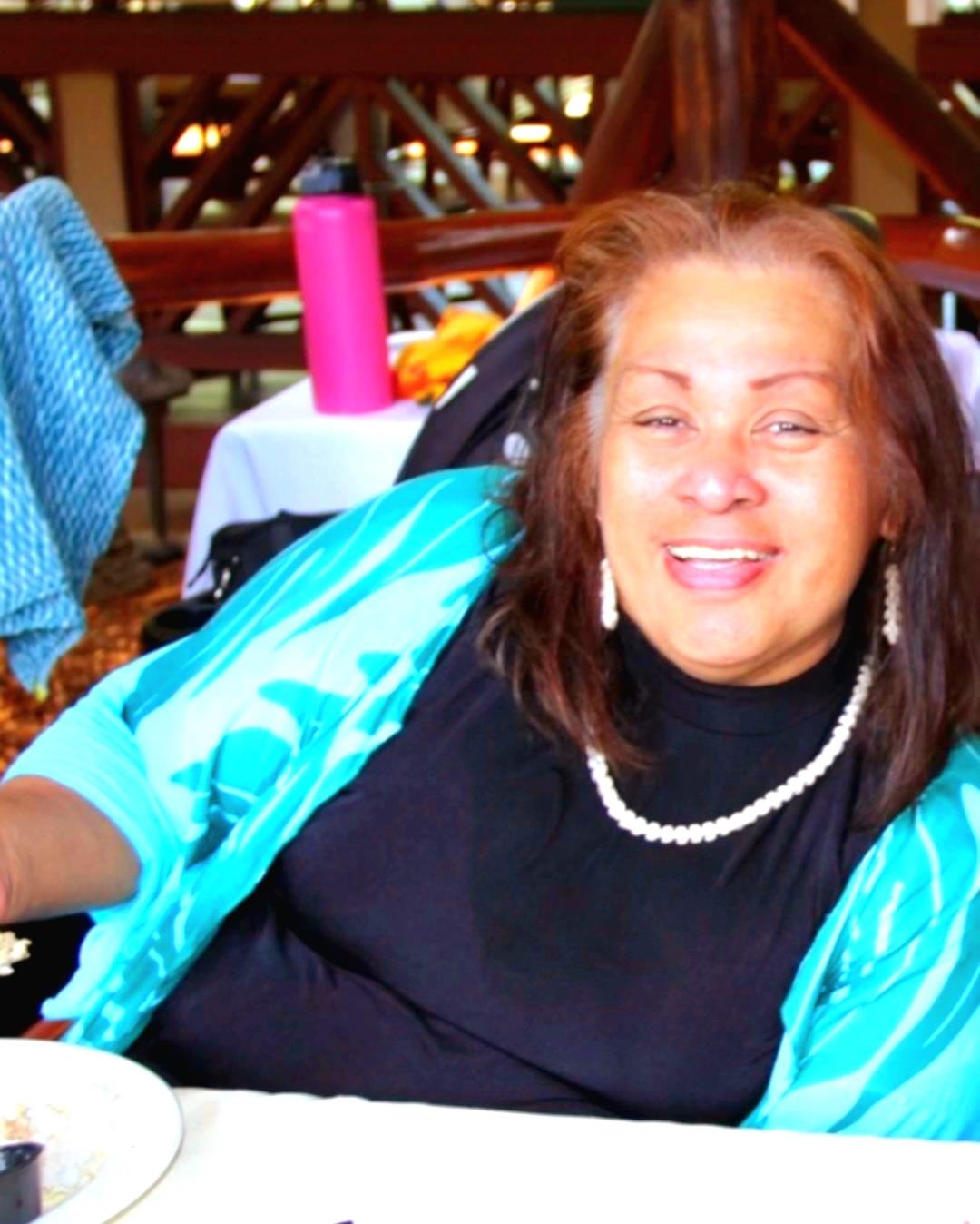 A woman sitting at a table
