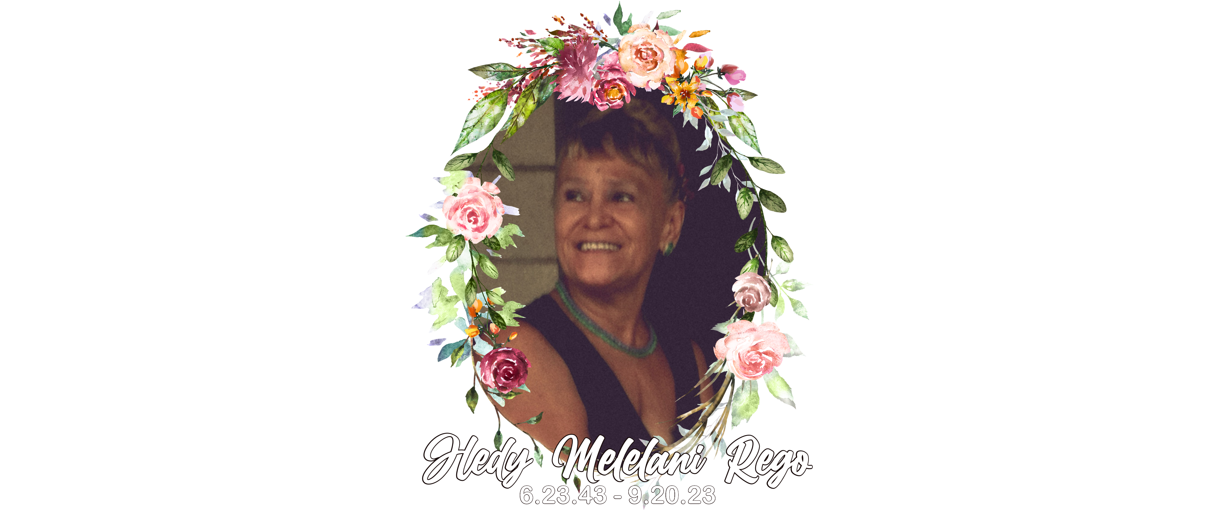 A woman smiling with flowers around her