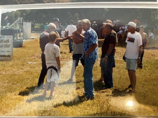 A group of people standing in a field