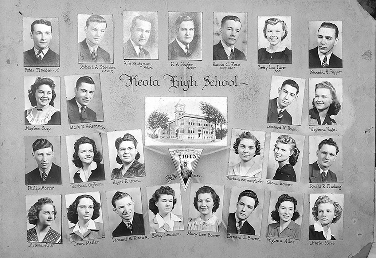A group of students and staff captured in a graduation portrait from Keota High School, 1943.