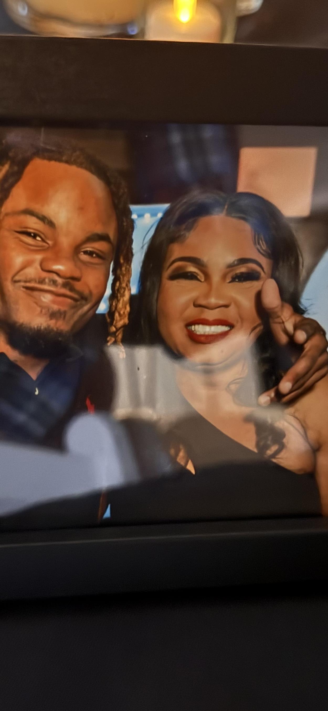 Two people share smiles and laughter inside a car during a warm evening, celebrating life.