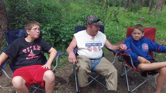 A group of people sitting in chairs