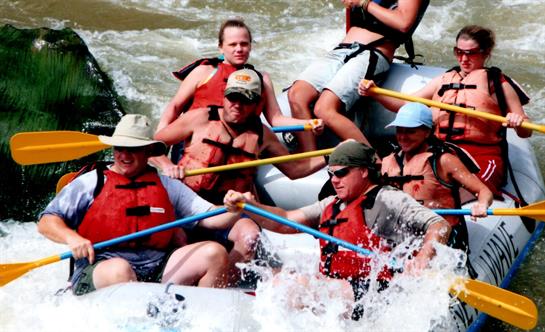 A group of people in a raft