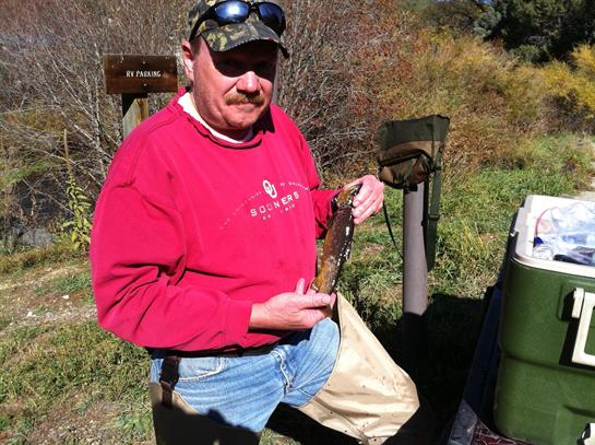 A man holding a fish