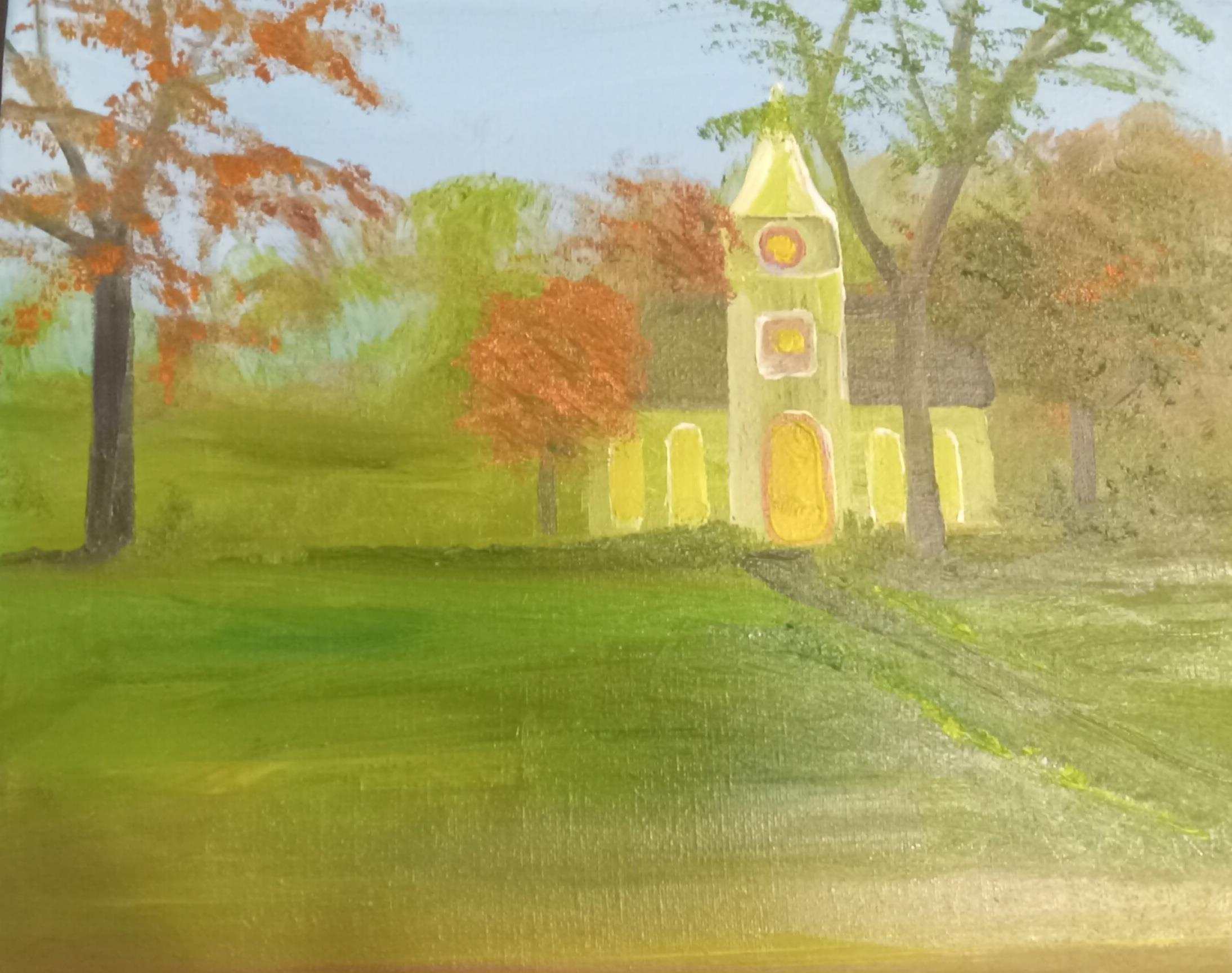 A small yellow church is nestled among autumn-colored trees in a serene rural landscape.