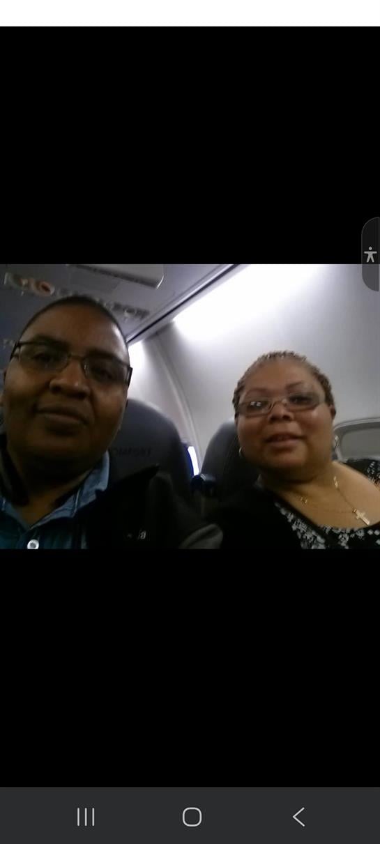 A man and woman taking a selfie