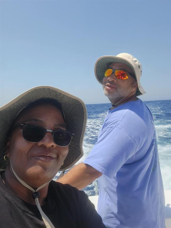 A man and woman on a boat