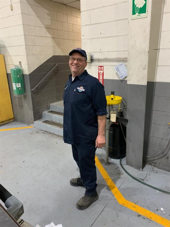 A man standing in a parking lot